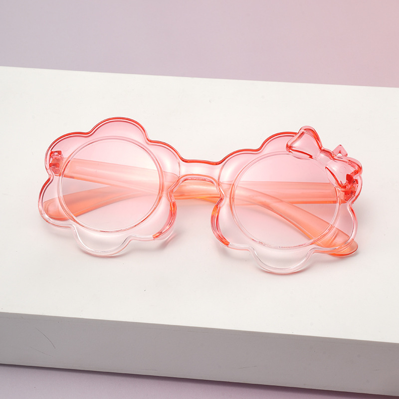 2025一体片彩色儿童太阳镜圆框小孩蝴蝶结眼镜防晒宝宝太阳花墨镜详情8