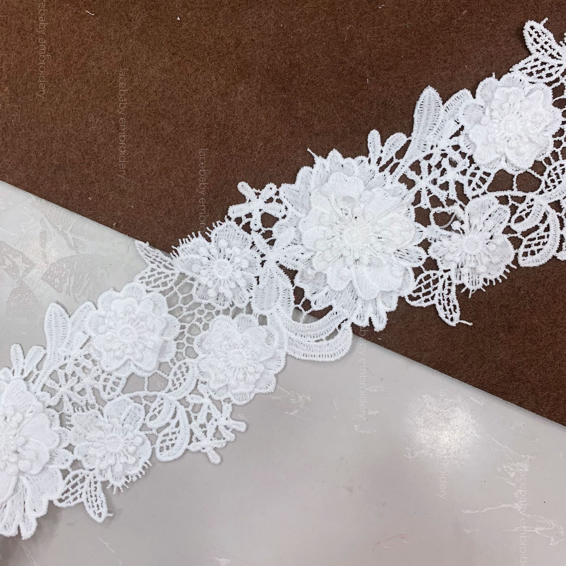 Three-dimensional lace milk silk polyester clothing accessories, home curtains and soft furnishings are available for wholesale from the manufacturer. Water-soluble lace pic 9