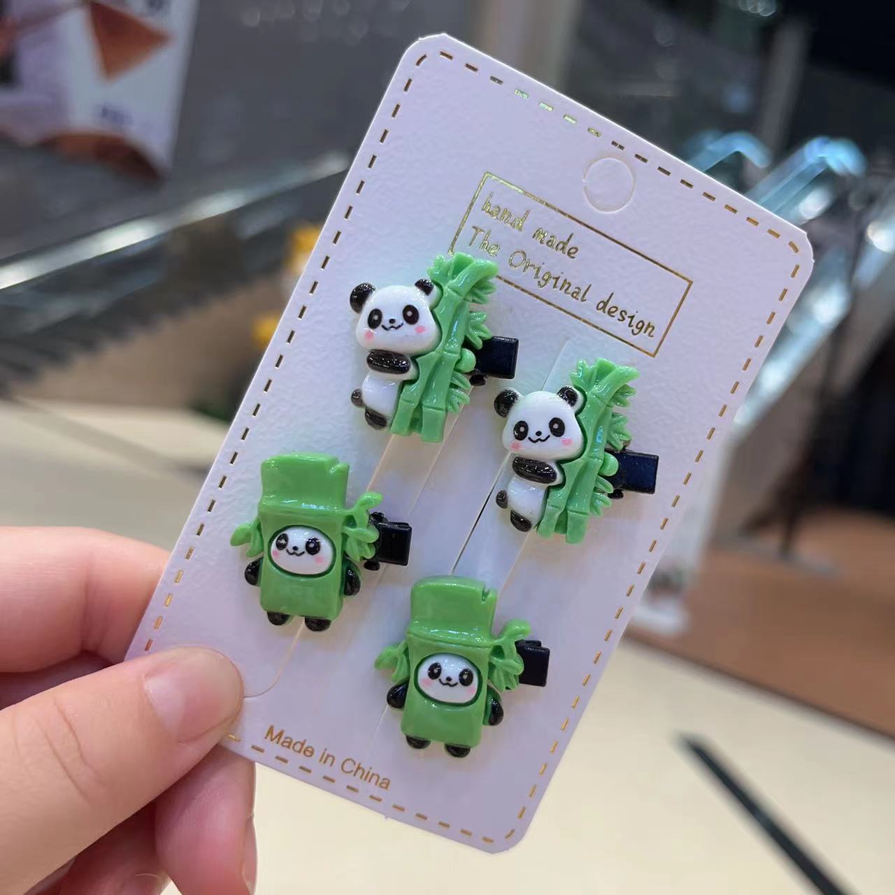 卡通可爱熊猫发绳新款亮面抱竹子熊猫发夹儿童鸭嘴夹发卡头饰批发详情3