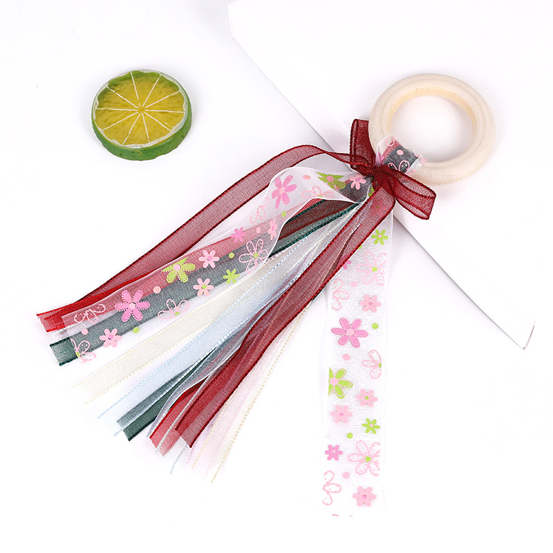 Детские игрушки с хрустящими жетонами, цветные цветные ленточки и банты, украшающие детскую комнату для скрежета зубов pic 7