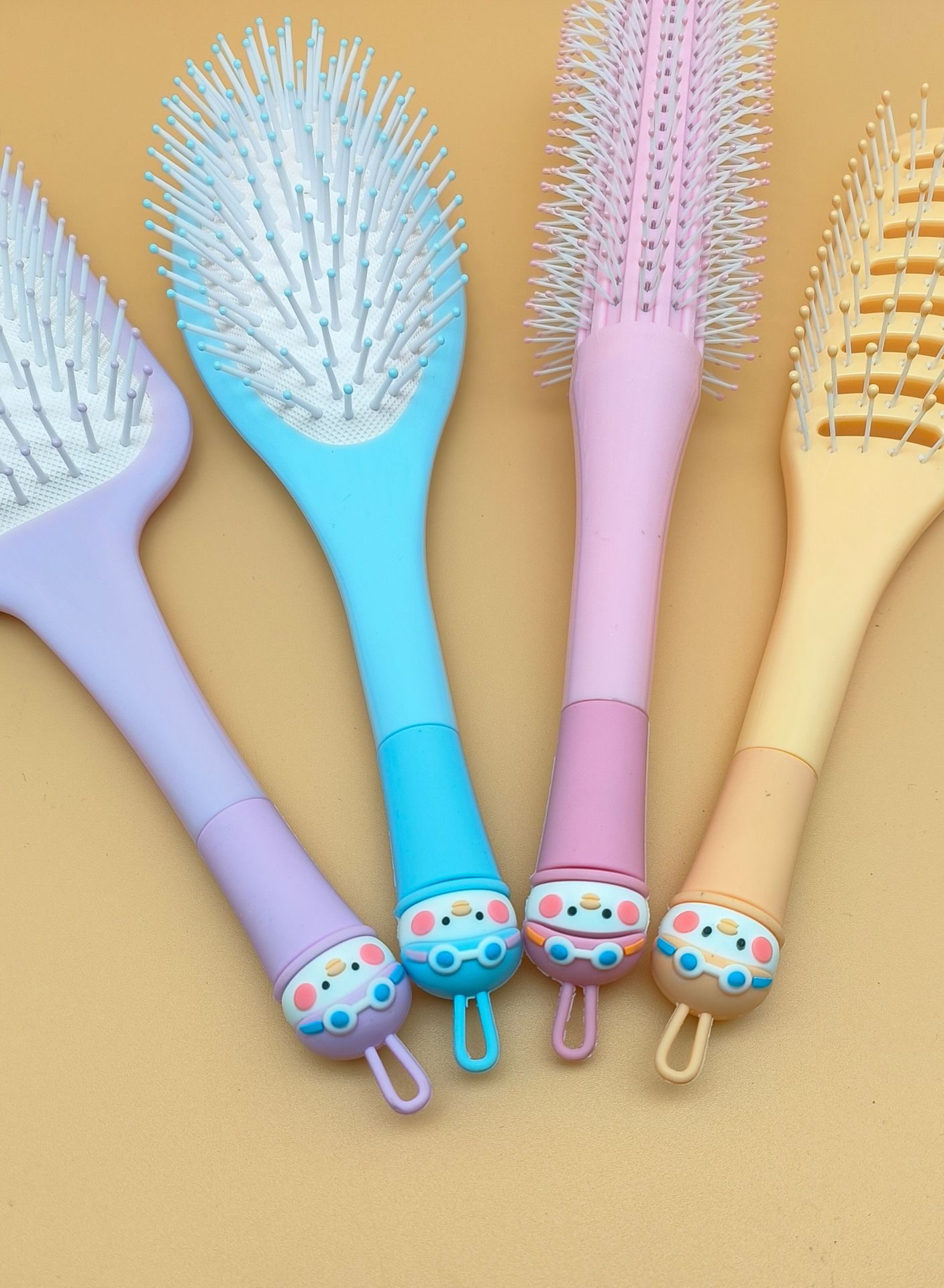 新款女生专用可爱卡通硅胶软头大方头气垫梳 蓬松造型气囊梳圆滚排骨梳 烧烤刷款式梳子详情36