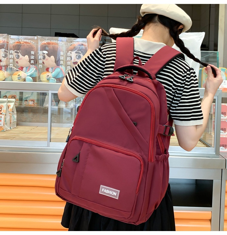 纯色学生书包女批发轻便大容量中大学生双肩包女3-6年级校园背包详情22