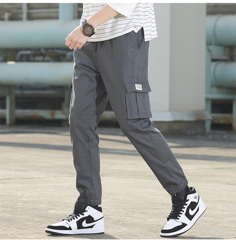 Pantalones de carga para hombres venta al por mayor primavera/otoño moda de día de algodón multibolsillos pantalones de pie cordones para hombres pantalones deportivos versátiles pic 14