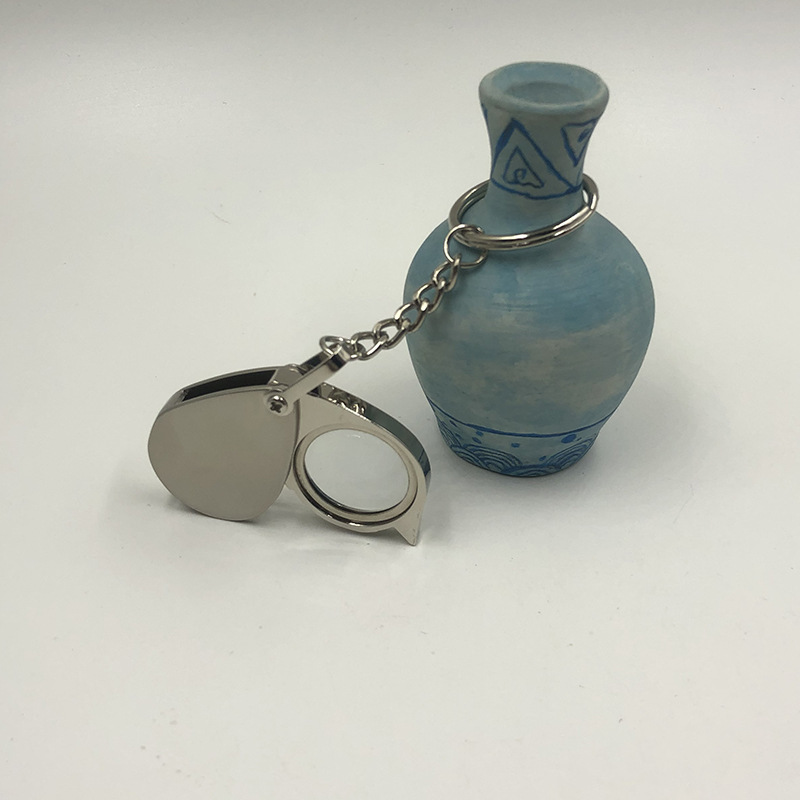 A 30mm diameter metal zinc alloy keychain can hold a portable magnifying glass with a 5x glass lens pic 12