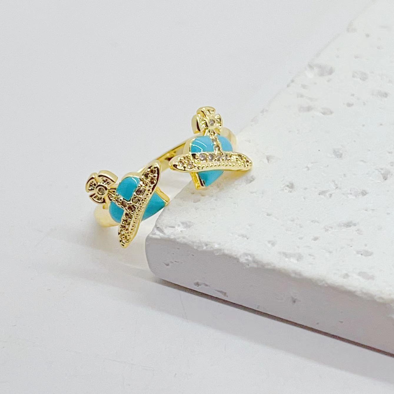 This cross-border e-commerce product features a unique and niche design for women. The oil drop ring has an adjustable opening. It is an event ring with 18K copper plating pic 4