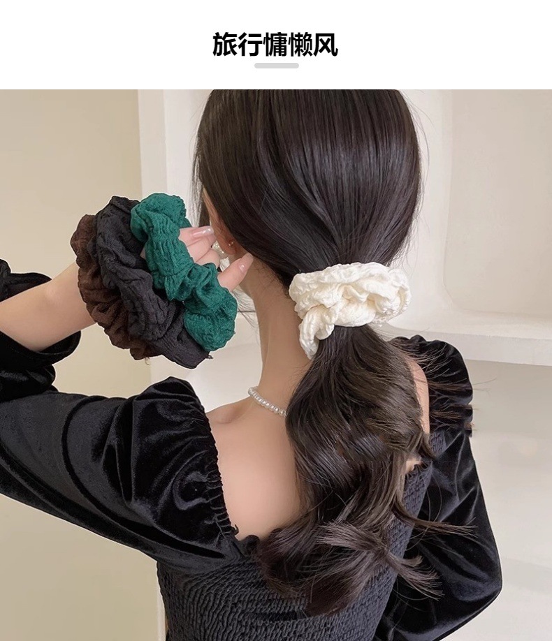 A retro French large intestine hair band for a woman with a simple and elegant ponytail bun. A hair tie, hair band, hair band and hair accessory for a woman pic 15