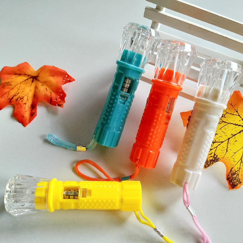 Mini small electric lights, small flashlights, LED plastic flashlights, small flashlights, colored hand lights that emit light, one yuan per piece supply pic 1