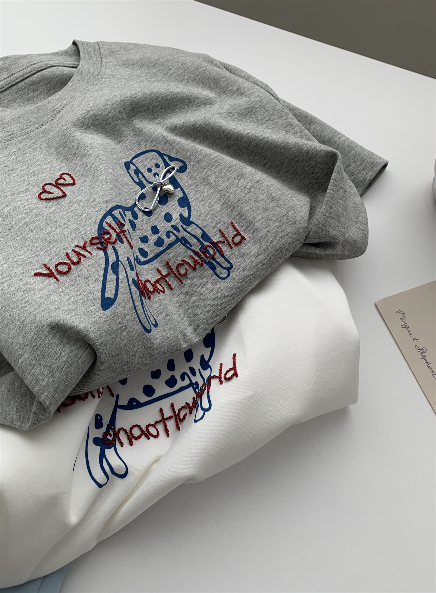 A trendy Korean-style loose and casual short-sleeved T-shirt with a bow and spotted dog print for women in summer, featuring pure cotton embroidery pic 20