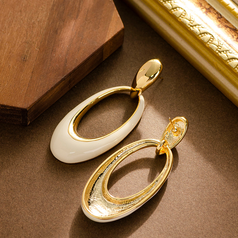 French elegant, retro, mid-style oil-dripping, hollowed-out geometric oval earrings, a niche and unique design sense, silver needle earrings pic 8