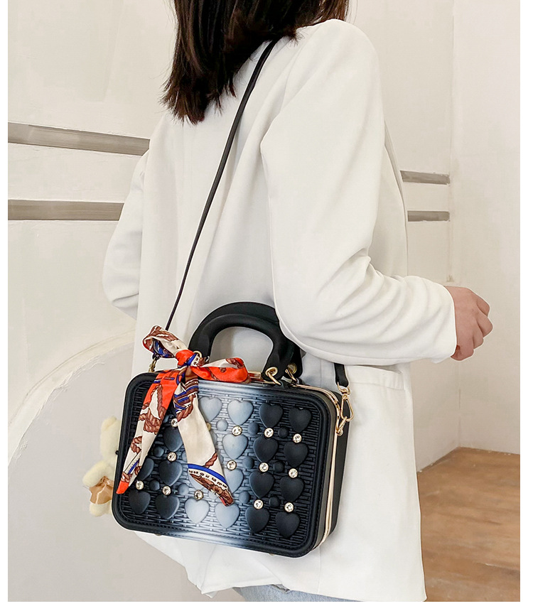 The 2021 Korean version of the trendy tote bag features a ribbon bow, an Instagram niche design with rivets and a slanted crossbody bag made of PU pic 21