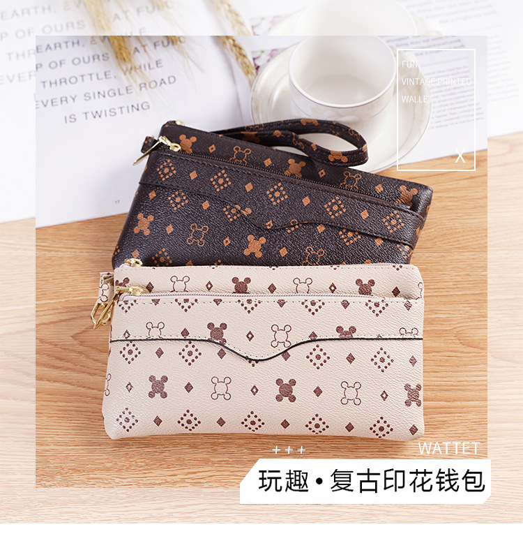 2021新款时尚印花女包手拿包手机包女士零钱包手拎包包买菜包包详情1