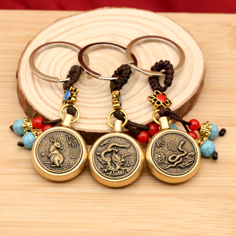 黄铜复古蓝珠绳中式生肖旋转创意钥匙扣配件小礼品小汽车挂件批发详情4