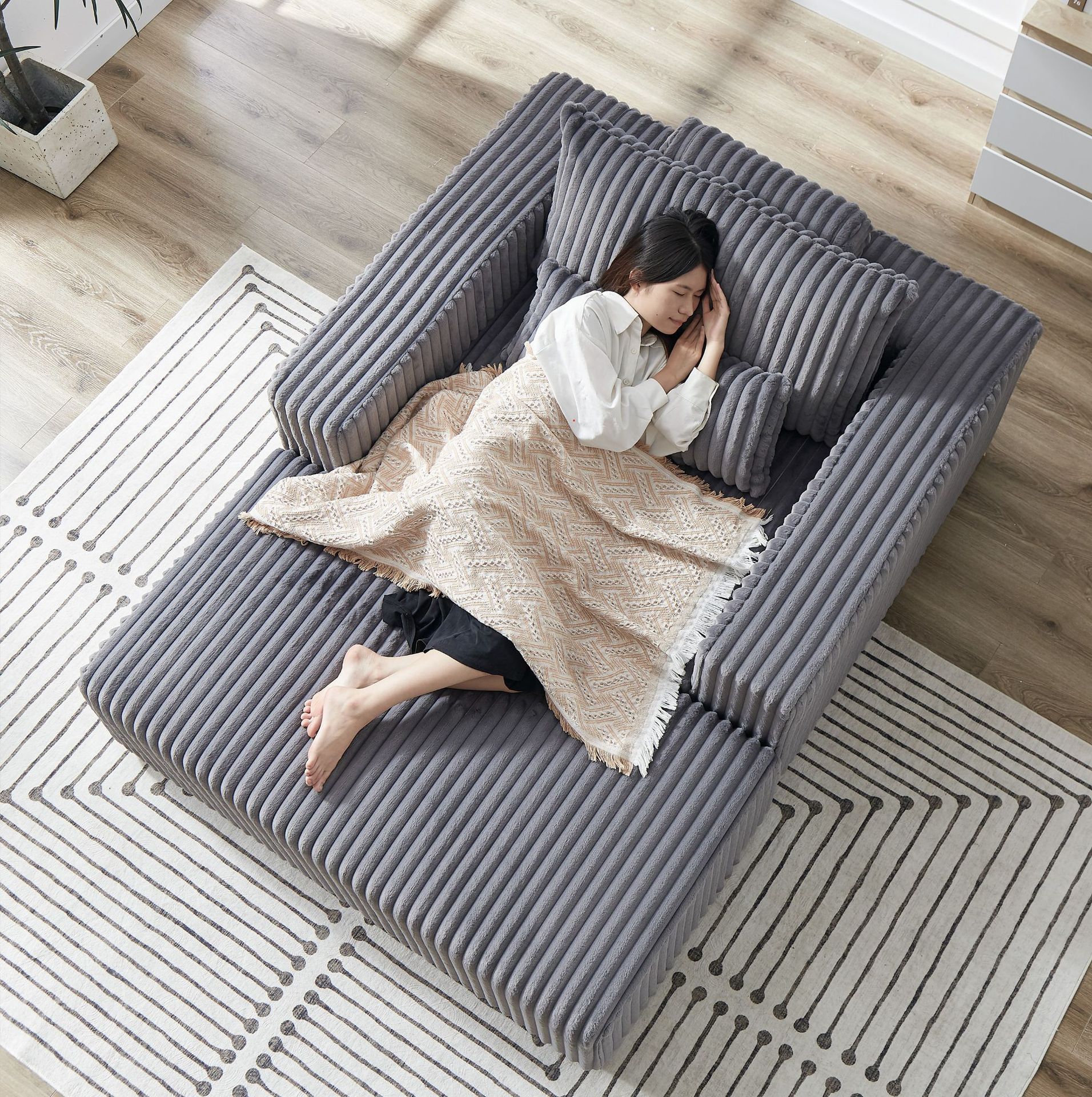 A single-person folding sofa bed with a cushion, pillow and compression sponge for both living room and bedroom