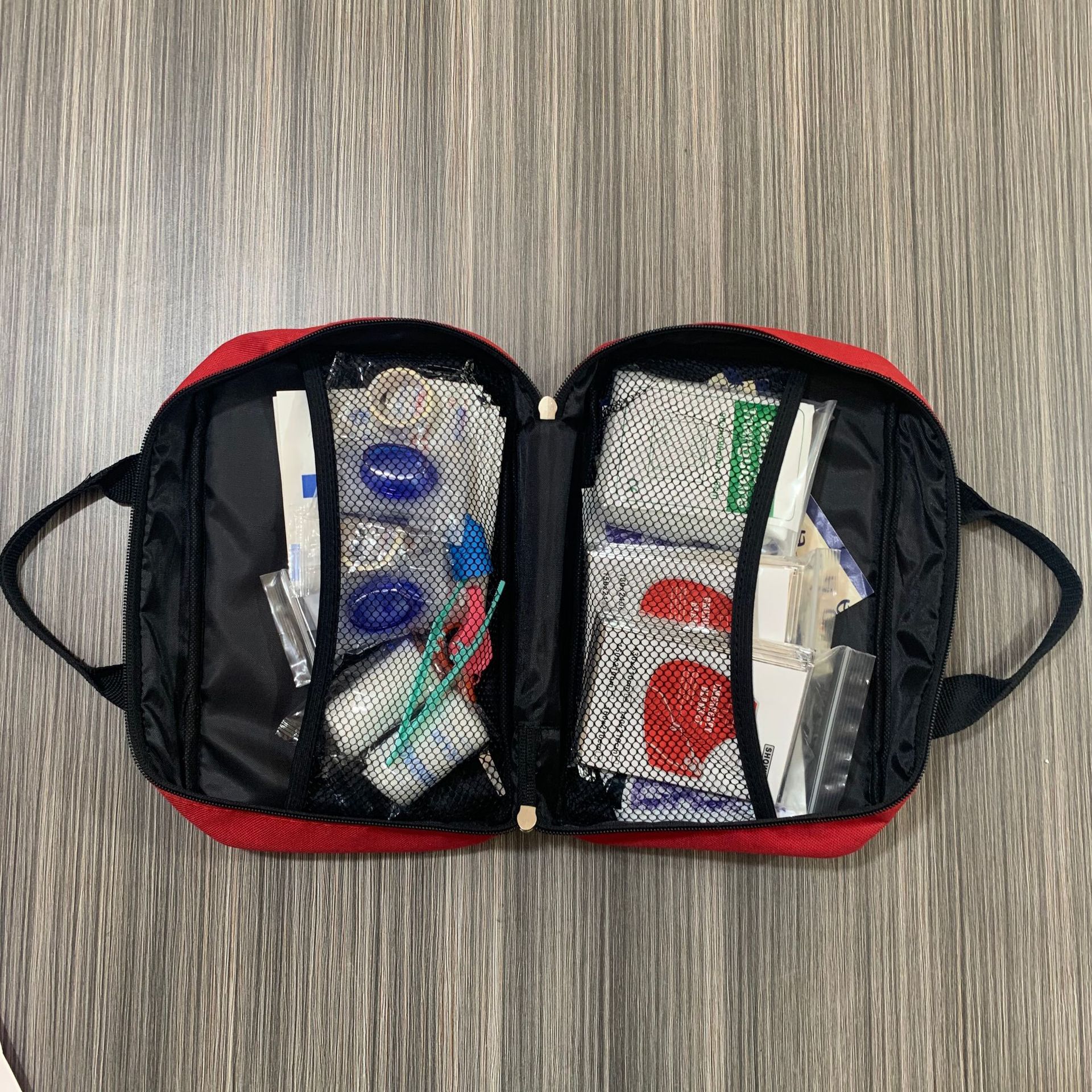 Foreign trade first aid kit, portable first aid kit, household hand-held rescue kit, multi-functional outdoor emergency set full figure