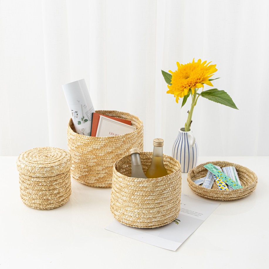 Yijia wheat straw hand-woven modern, simple, fashionable, elegant and high-end storage basket, souvenir and snack storage box, desktop miscellaneous items, covered round storage basket