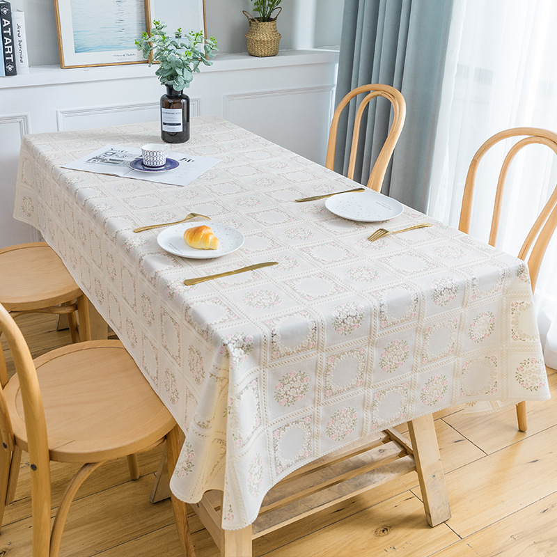 Yijia lace tablecloth is waterproof, oil-proof, no-wash and heat-resistant. It is a white rectangular tablecloth and pvc home coffee table mat