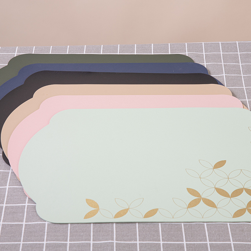 Creative 1.6mm new Chinese-style placemats with leaf patterns are washable, waterproof, oil-proof, anti-slip, heat-resistant and wear-resistant. They are home PVC leather placemats in Chinese style
