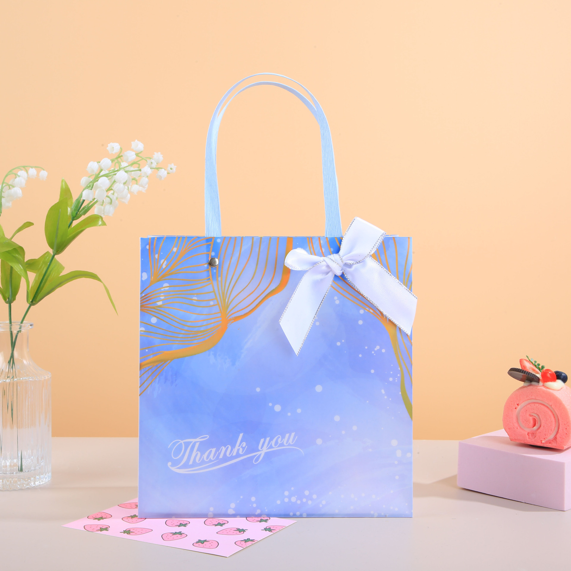 节日手提袋礼品袋蛋糕学生伴手礼磨砂鲜花手提袋化妆品蝴蝶结PP袋详情5