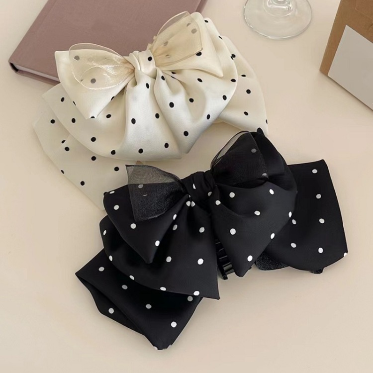 Korean-style polka dot satin bow ponytail clipper with a high-end and elegant look, upside-down hair at the back of the head, shark clip hair accessory full figure