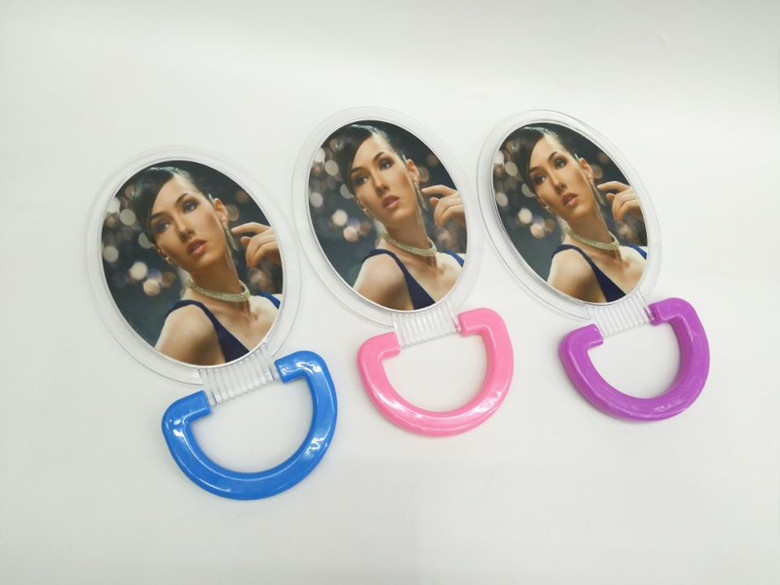 The new plastic-framed folding single-sided desktop mirror is a best-selling daily necessities and cosmetic mirror details Picture