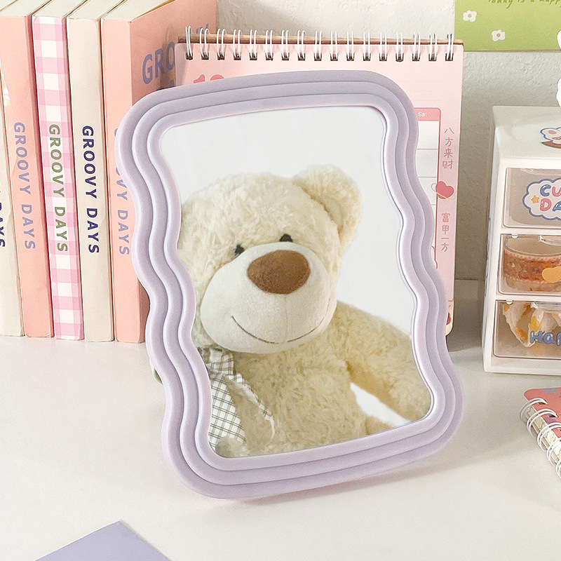 New type of plastic makeup mirror for desktop students, movable with stand, foldable and hanging, single-sided mirror, bedroom princess mirror Application Scenario
