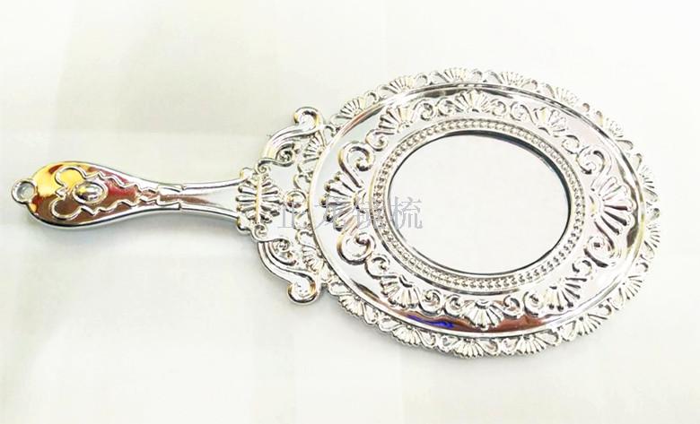 Wholesale of new best-selling double-sided handle makeup mirrors, portable European-style patterned handheld mirrors details Picture