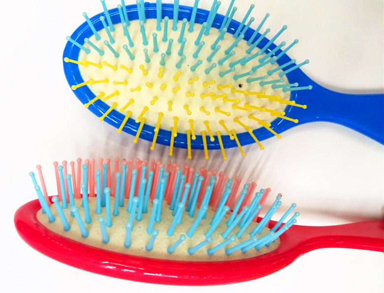 We supply new dual-color color needle massage combs, popular daily necessities, hair care combs and gift combs details Picture
