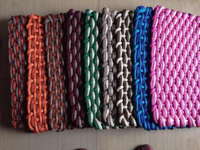 Red Sun Factory Direct sales of green-edge rope strip carpets in rectangular rows. Affordable prices and bright patterns