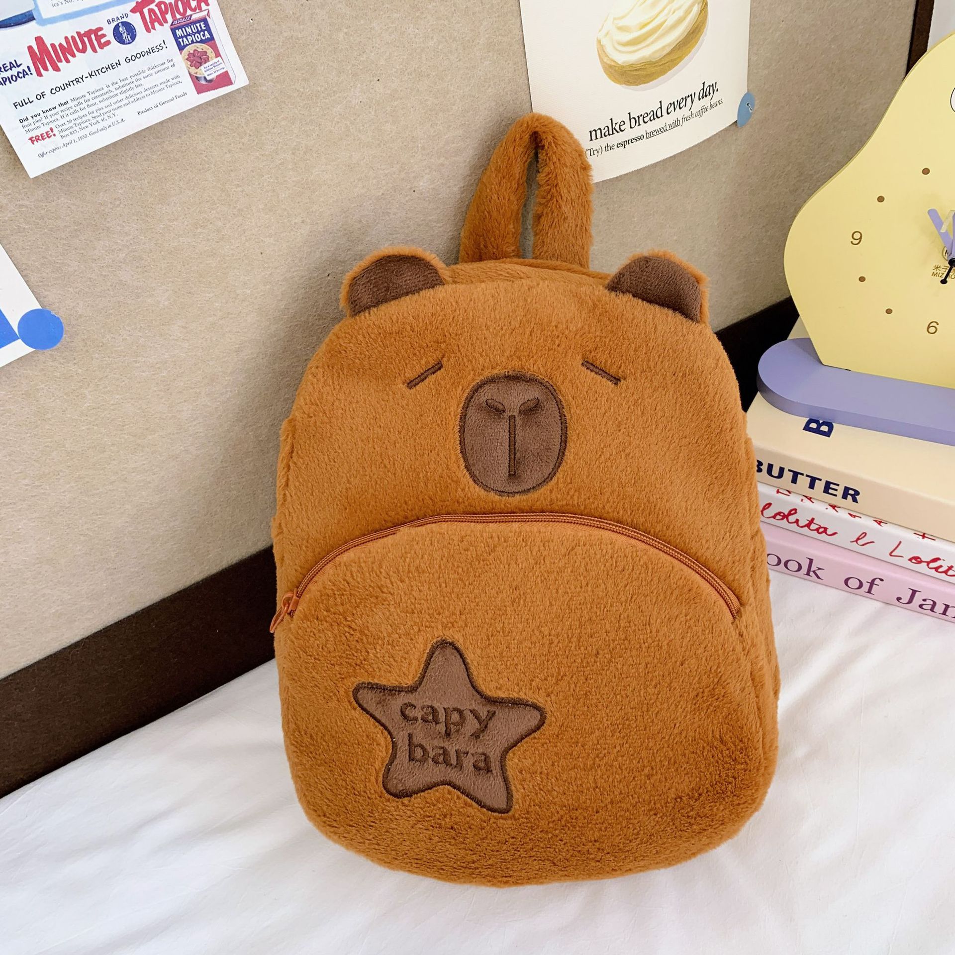 The new Capibara plush capybara is cute and versatile. It features a cartoon student backpack and an export cross-border bag Item Picture