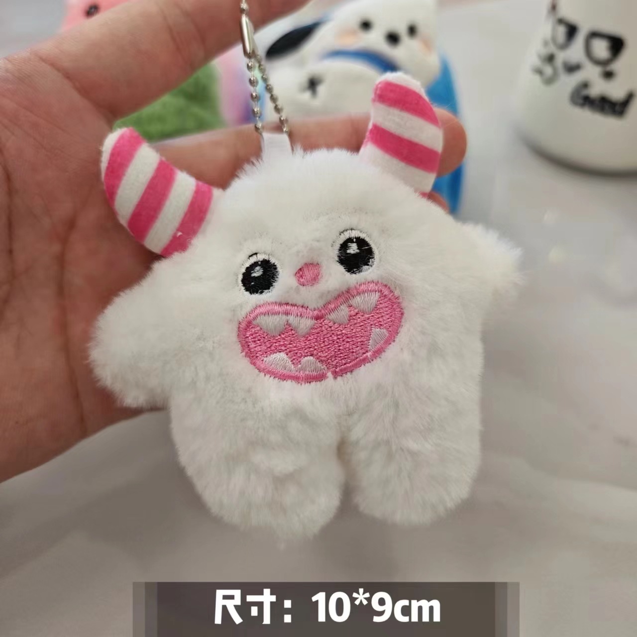 Xiaohongshu's same style of little snow monster plush keychain, cute mouse schoolbag pendant, bag accessory, claw machine doll Item Picture