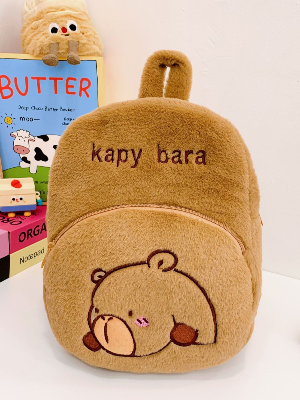 The new Capibara plush capybara is cute and versatile. It features a cartoon student backpack and an export cross-border bag details Picture