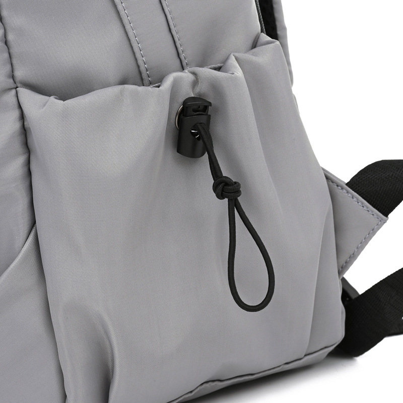 学生旅行背包男女尼龙布包休闲电脑户外双肩包中学生双肩书包批发