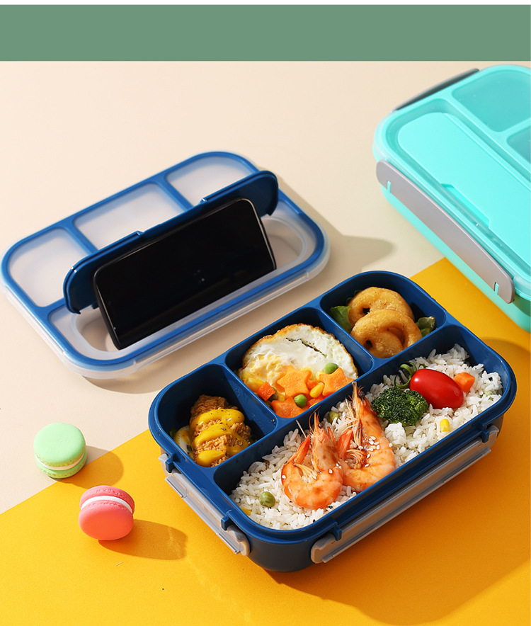 A four-compartment plastic lunch box that can be used in a microwave oven pic 17