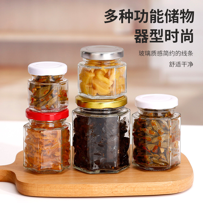 Factory direct supply hexagonal honey glass bottles, sealed storage jars, transparent thickened glass pickled vegetable bottles, household canned bottles