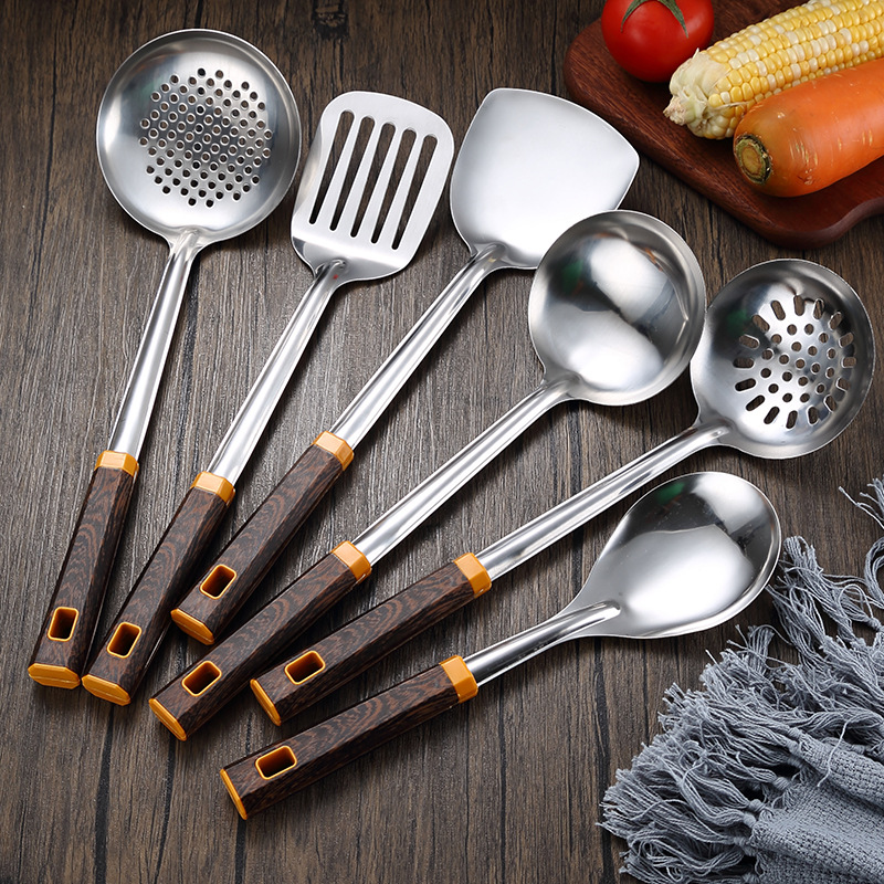Wholesale household stainless steel spatulas, thickened soup spoons, kitchen chef's cooking and stir-frying spatulas, auspicious wood grain handles details Picture
