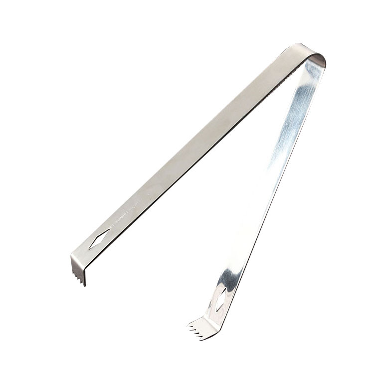 مقاطع من الصلب غير القابل للصدأ مع منشفات وقطعة خبز مع مفردات من الطعام في مطابخ Item Picture