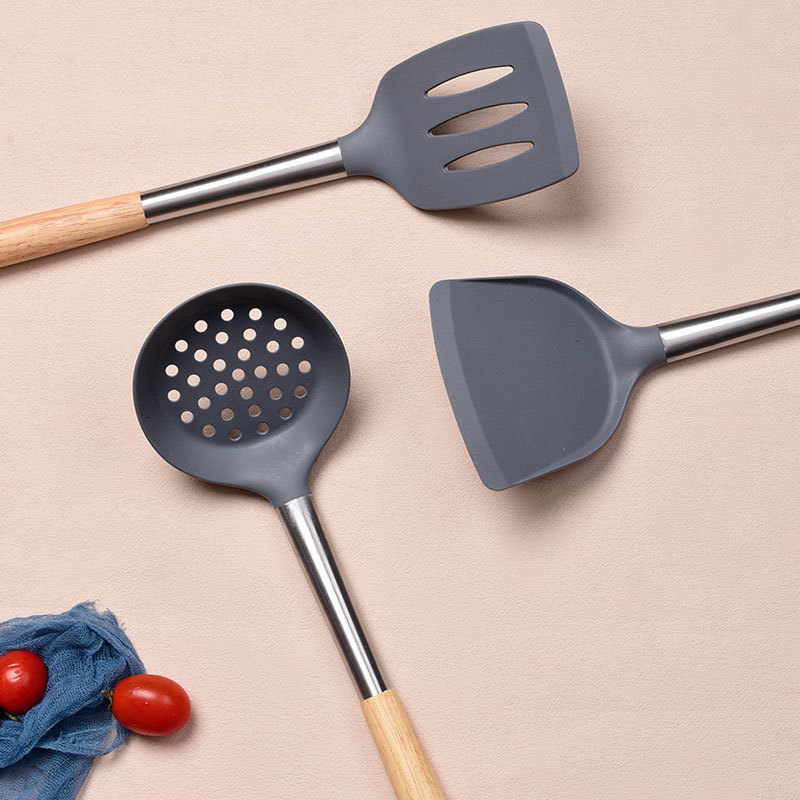 A 4-piece set of large grey wood-handled silicone spatula, a kitchenware set specially designed for non-stick cooking pans with silicone spatula and spoons details Picture