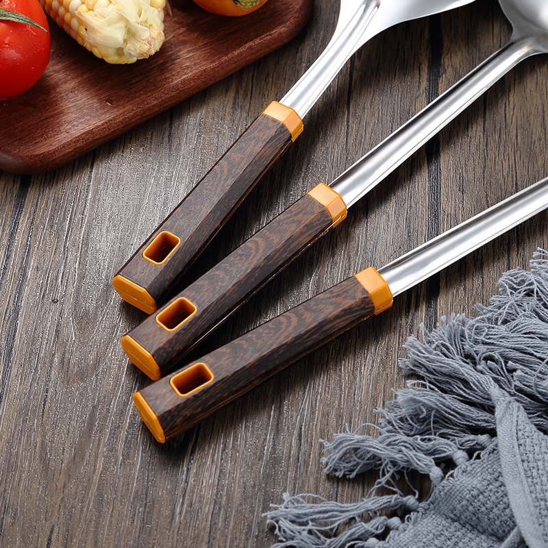 Wholesale household stainless steel spatulas, thickened soup spoons, kitchen chef's cooking and stir-frying spatulas, auspicious wood grain handles details Picture