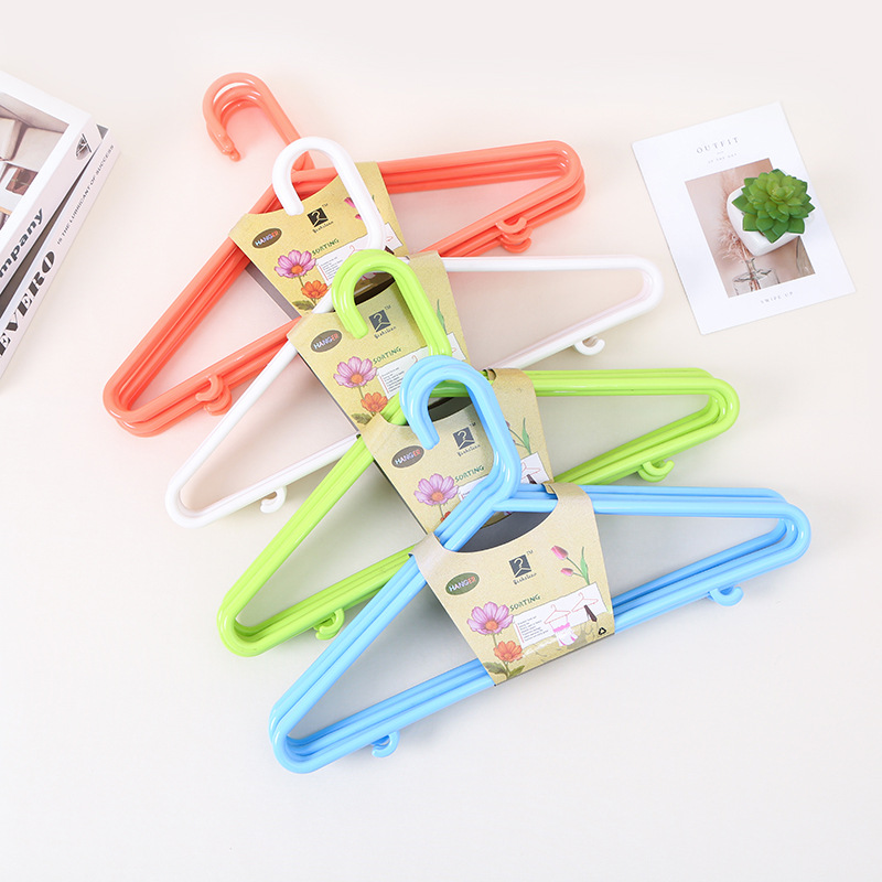 Adulto colorido nuevo colgador de plástico sólido engrosado simple balcón armario colgador de ropa de doble uso seco y húmedo colgador de secado
