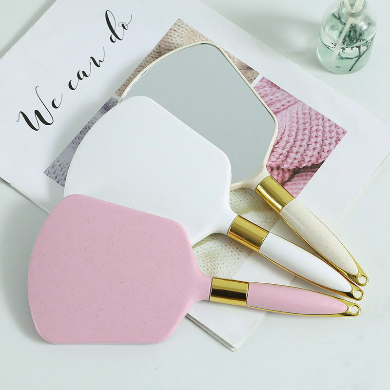 High-definition handle makeup mirror, European-style handheld beauty handle mirror, portable and portable, high-end retro patterned mirror wholesale