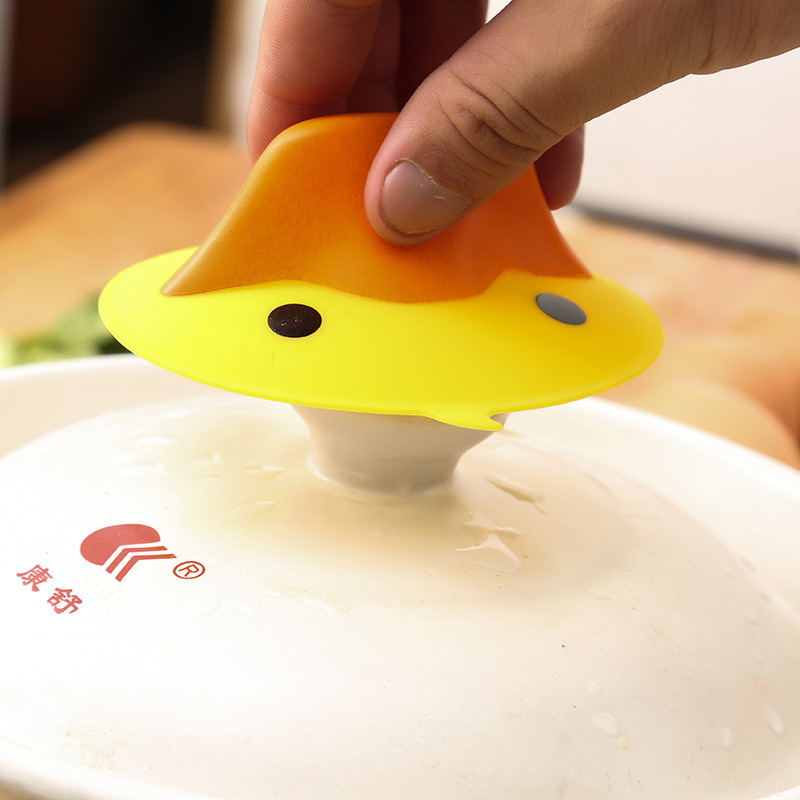 The manufacturer wholesals a pair of creative cartoon little yellow duckbill silicone anti-heat and anti-slip clips and heat insulation clips Specification image