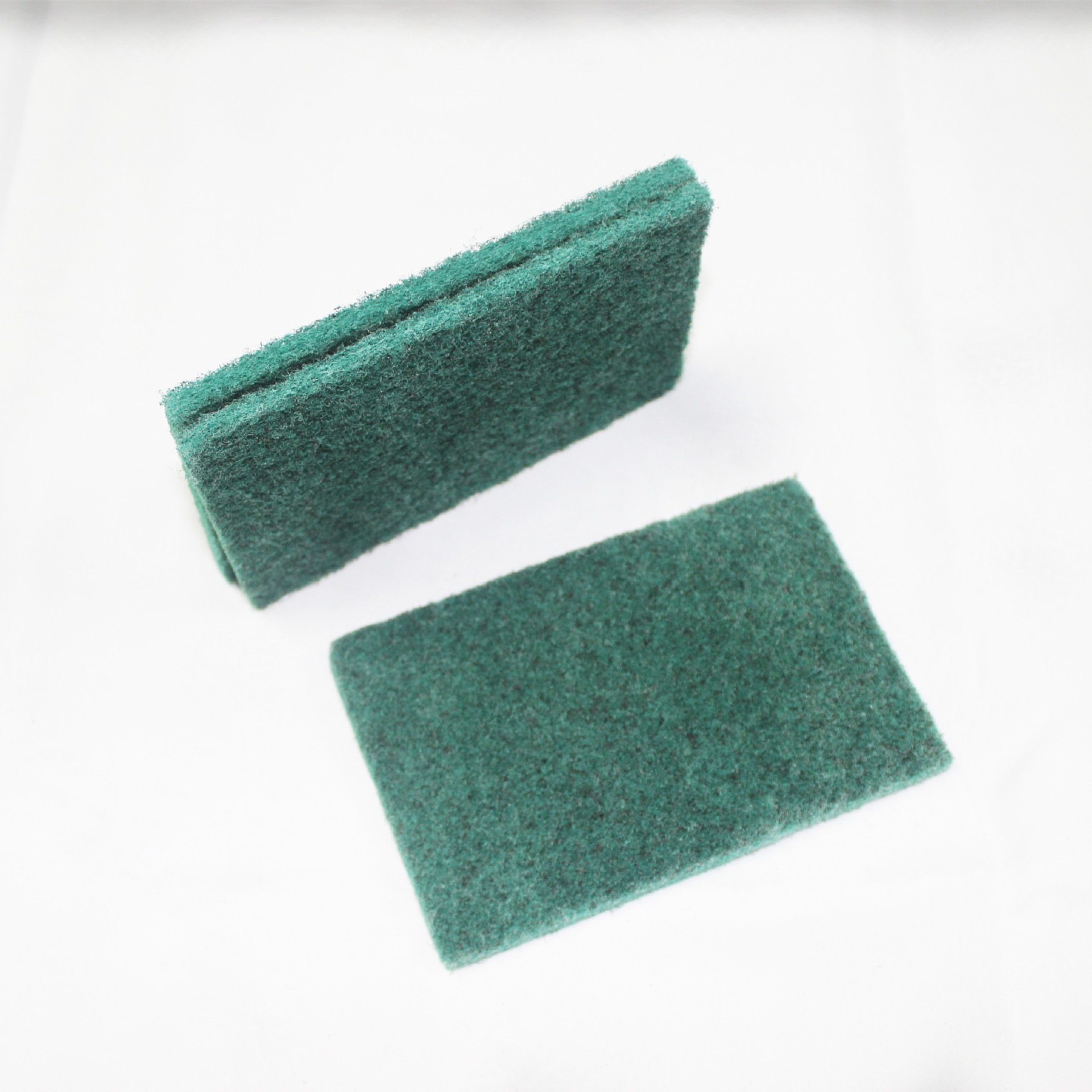 Factory wholesale of dark green square scouring pads, dishwashing scrubs, cleaning cloths, dishwashing cloths and daily cleaning products