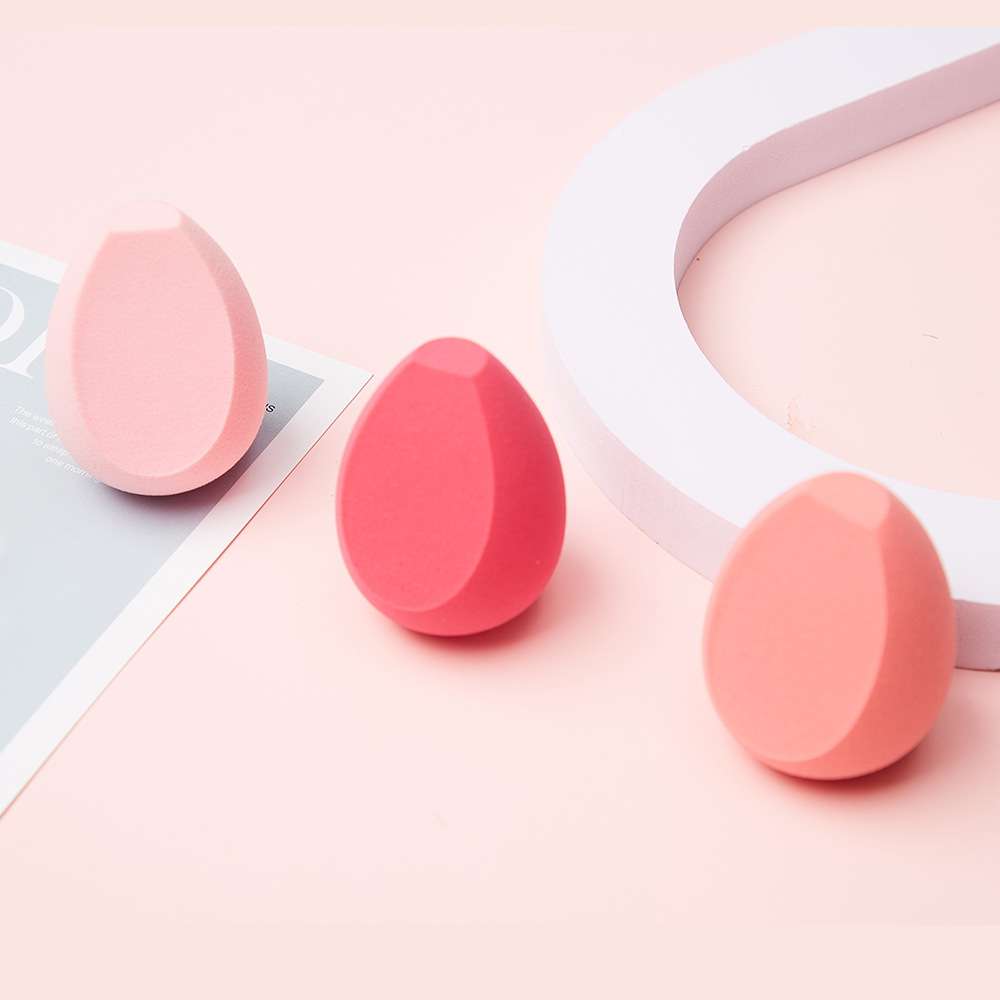 Factory wholesale non-latex rocket-head olive diagonally cut in two pieces powder puffs, irregular-shaped dry and wet dual-purpose beauty eggs pic 2