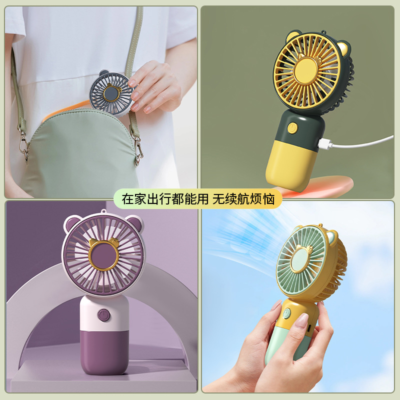 New cartoon handheld mini fan UBS charging power Summer Play office portable handheld fan wholesale gift details Picture