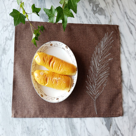 New eco-friendly single-layer feather embroidery cotton and linen fabric placemats, Japanese and European style heat insulation pads, table plate pads, bowl pads and coaster pads