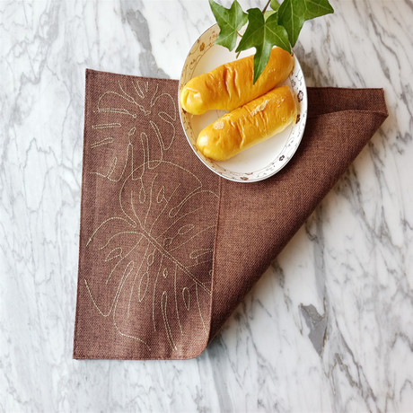 Double-layer leaf-embroidered cotton and linen fabric placemats, Japanese-style and European-style heat-insulating dining tables, DIY creative coasters, children's heat-resistant pads Application Scenario