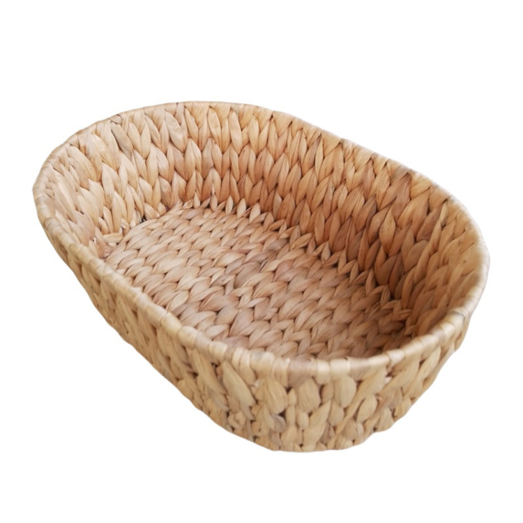 The water hyacinth desktop storage oval-shaped multi-functional organization box features a simple design