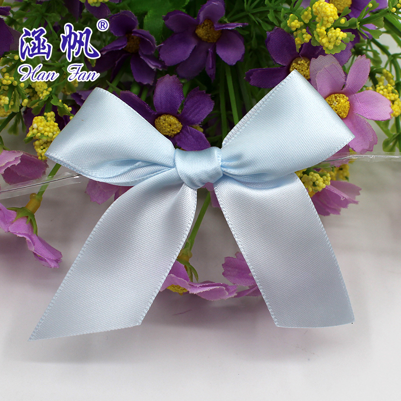 Professional custom-made bows, handcrafted bows with polyester bands and transparent tied silk bows details Picture