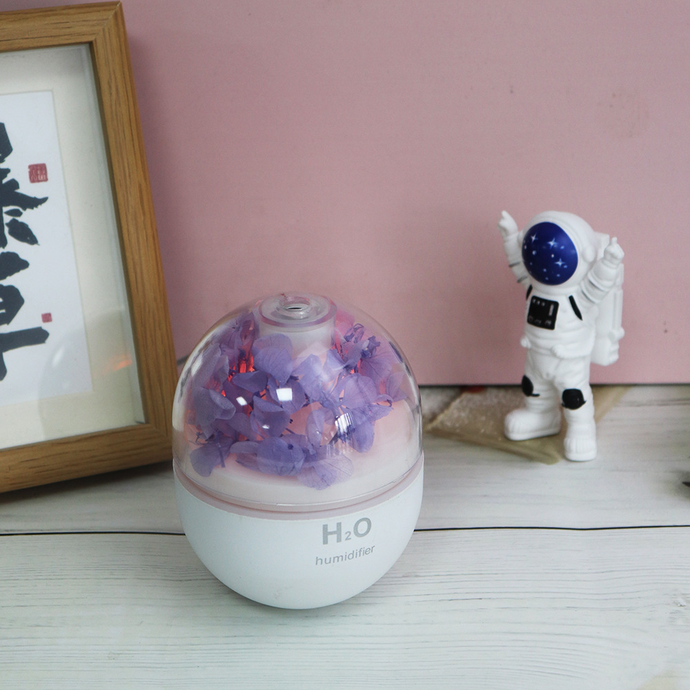 The new Everlasting Flower humidifier is a portable car and home USB water replenishment atomization soft sound night light creative humidifier Item Picture