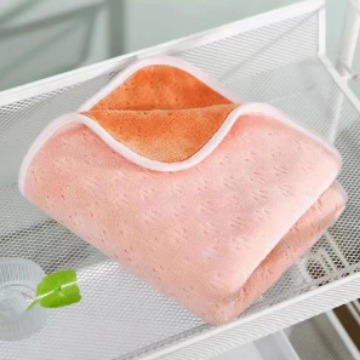 The multi-color towel can be used on both sides. It is a composite absorbent adult household and couple's non-shedding coral fleece color-blocking face towel